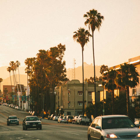 cars driving down a Los Angeles Street