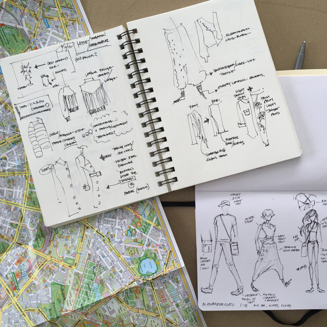 fashion sketches and a city map