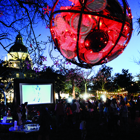 /Dreamy outdoor gathering of ArtNight Pasadena attendees.